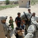 Team 'Tribal' delivers smiles to Iraqi children