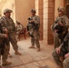 U.S., Iraqi troops visit orphanage