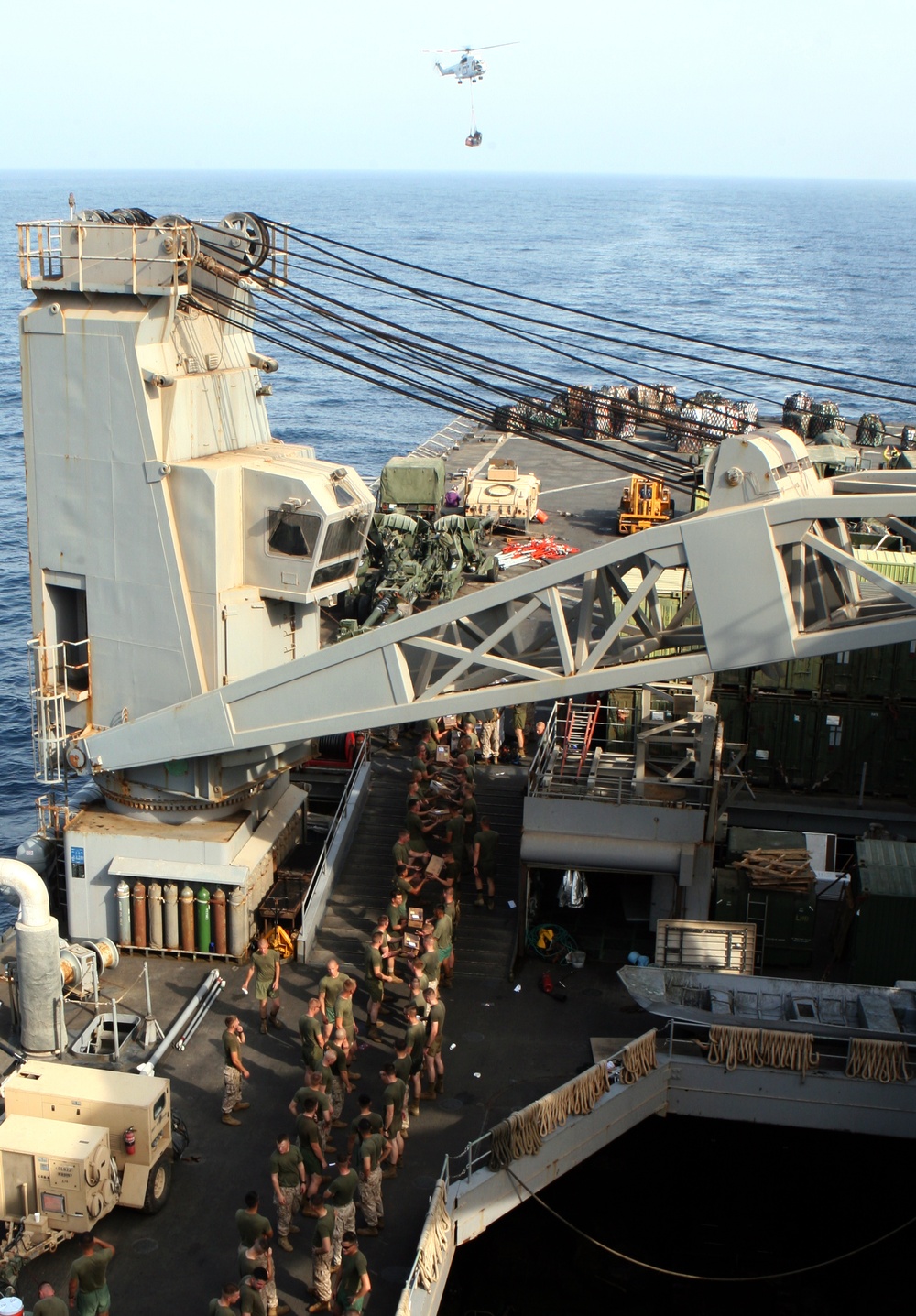 22nd MEU Marines assist with vertical resupply aboard USS Fort McHenry