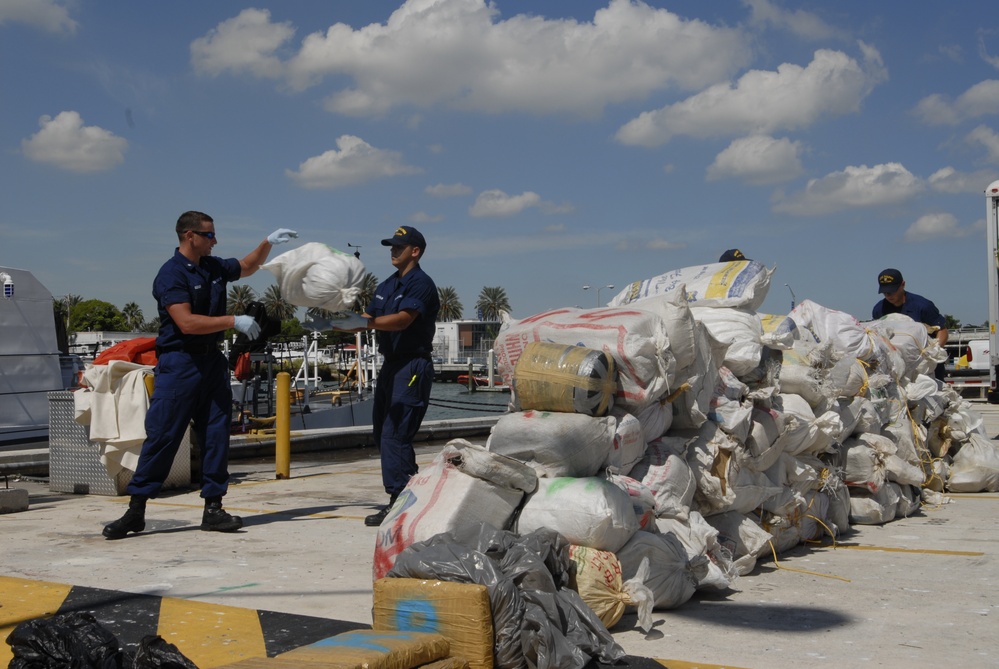 Coast Guard Cutter Dolphin Crewmembers Offload 2,500 Pounds of Marijuana