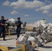 Coast Guard Cutter Dolphin Crewmembers Offload 2,500 Pounds of Marijuana