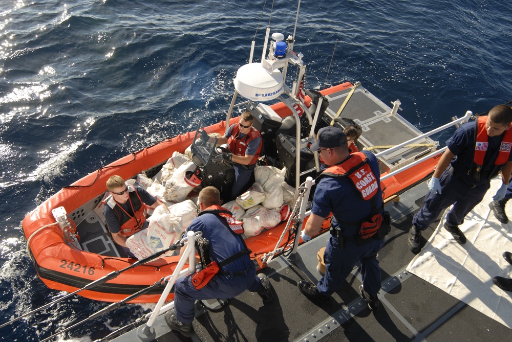 Coast Guard Cutter Dolphin Crewmembers Offload 2,500 Pounds of Marijuana