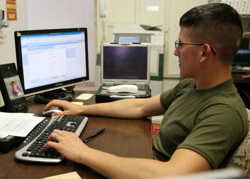 Marine Works Towards College Degree While Serving in Iraq