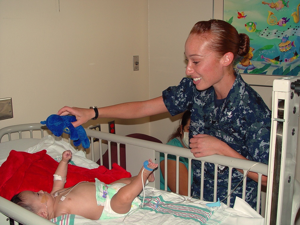 Sailors interact with local community