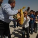 U.S., Iraqi soldiers visit school children