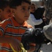 U.S., Iraqi soldiers visit school children
