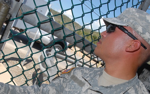 Guantanamo military police keep watch