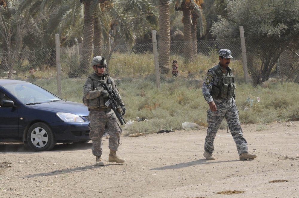 Iraqi, U.S. investigate cache site
