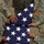 Soldiers fold flag for reenlistment