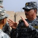 Iraqi general visits with artillery soldiers