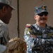 Iraqi general visits with artillery soldiers