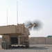 Iraqi general visits with artillery soldiers