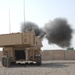 Iraqi general visits with artillery soldiers