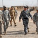 Iraqi general visits with artillery soldiers