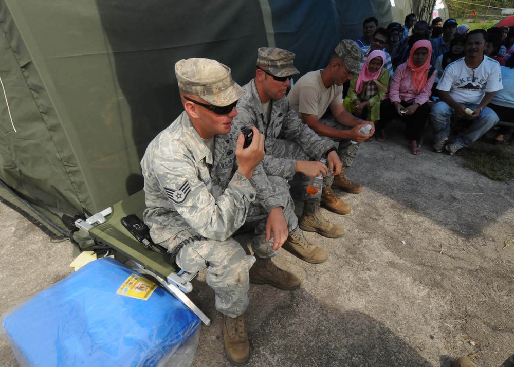 U.S. Air Force humanitarian assistance rapid response team cares for earthquake victims