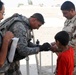 Medic lends helping hand to Iraqi children