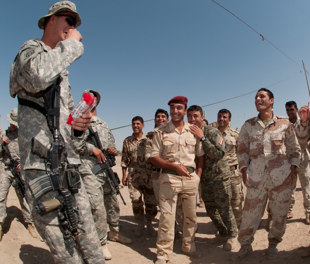 Iraqi Recon Soldiers, U.S. Paratrooper Advisors Share War Fighting Techniques During Joint Training