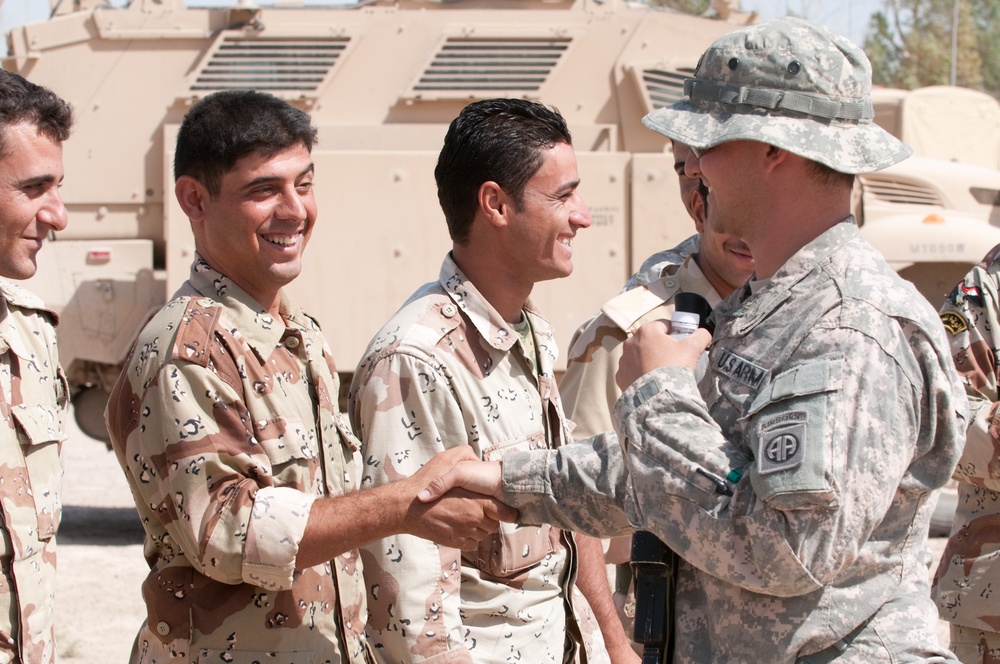 Iraqi Recon Soldiers, U.S. Paratrooper Advisors Share War Fighting Techniques During Joint Training