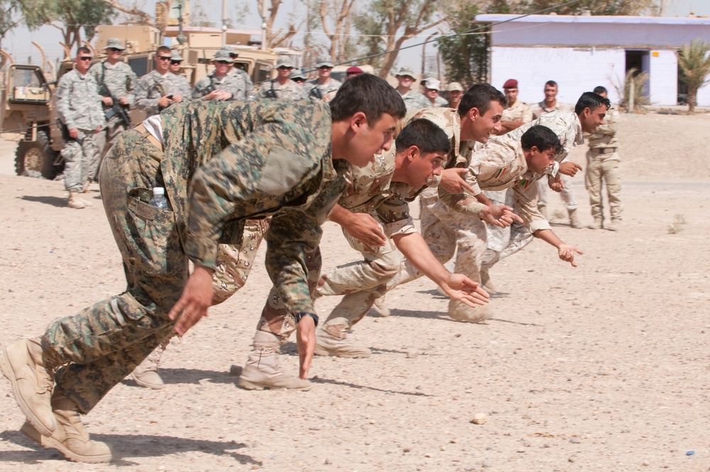 Iraqi Recon Soldiers, U.S. Paratrooper Advisors Share War Fighting Techniques During Joint Training