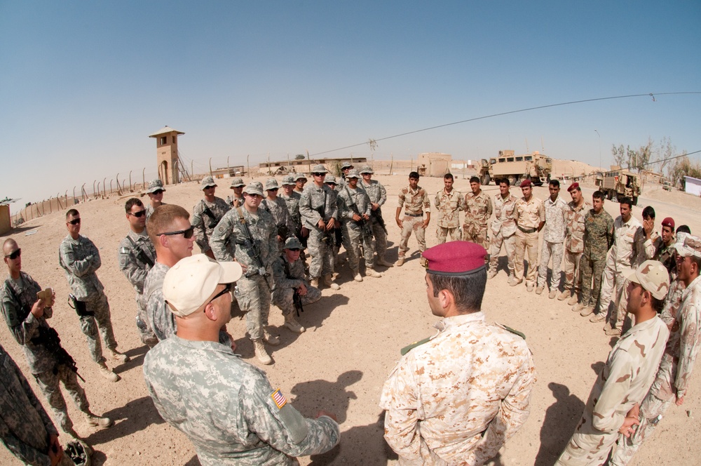 Iraqi Recon Soldiers, U.S. Paratrooper Advisors Share War Fighting Techniques During Joint Training