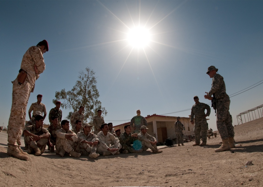 Iraqi Recon Soldiers, U.S. Paratrooper Advisors Share War Fighting Techniques During Joint Training