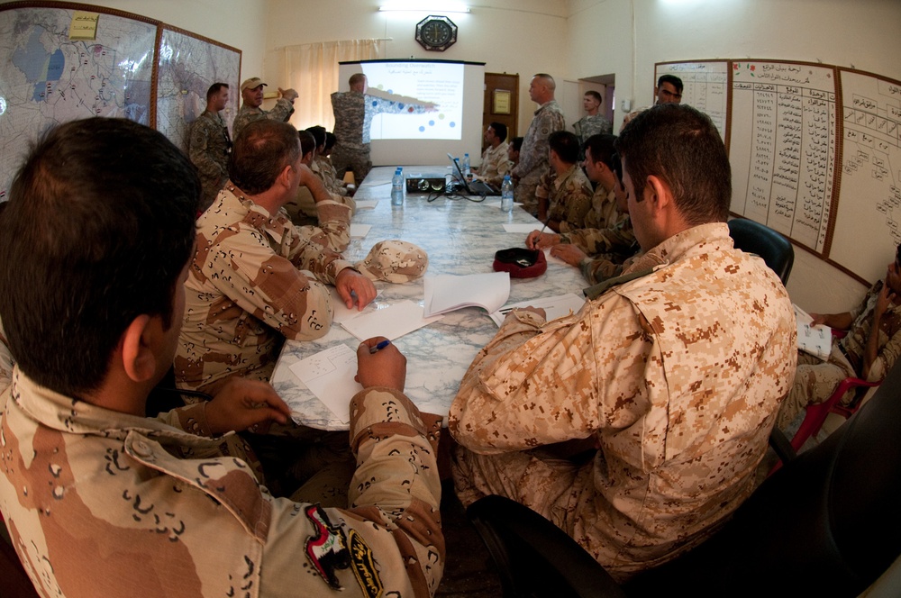 Iraqi Recon Soldiers, U.S. Paratrooper Advisors Share War Fighting Techniques During Joint Training