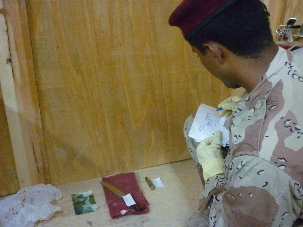 Crime scene investigators work to protect Maysan