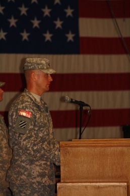 Commanders pass company guidon in Iraq