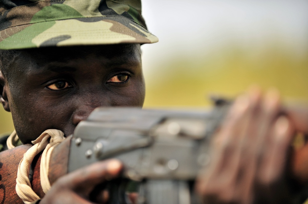 A Uganda Peoples Defense Force soldier demonstrates skills learned during the UPDF Non-Commissioned Officers Academy in Jinja.