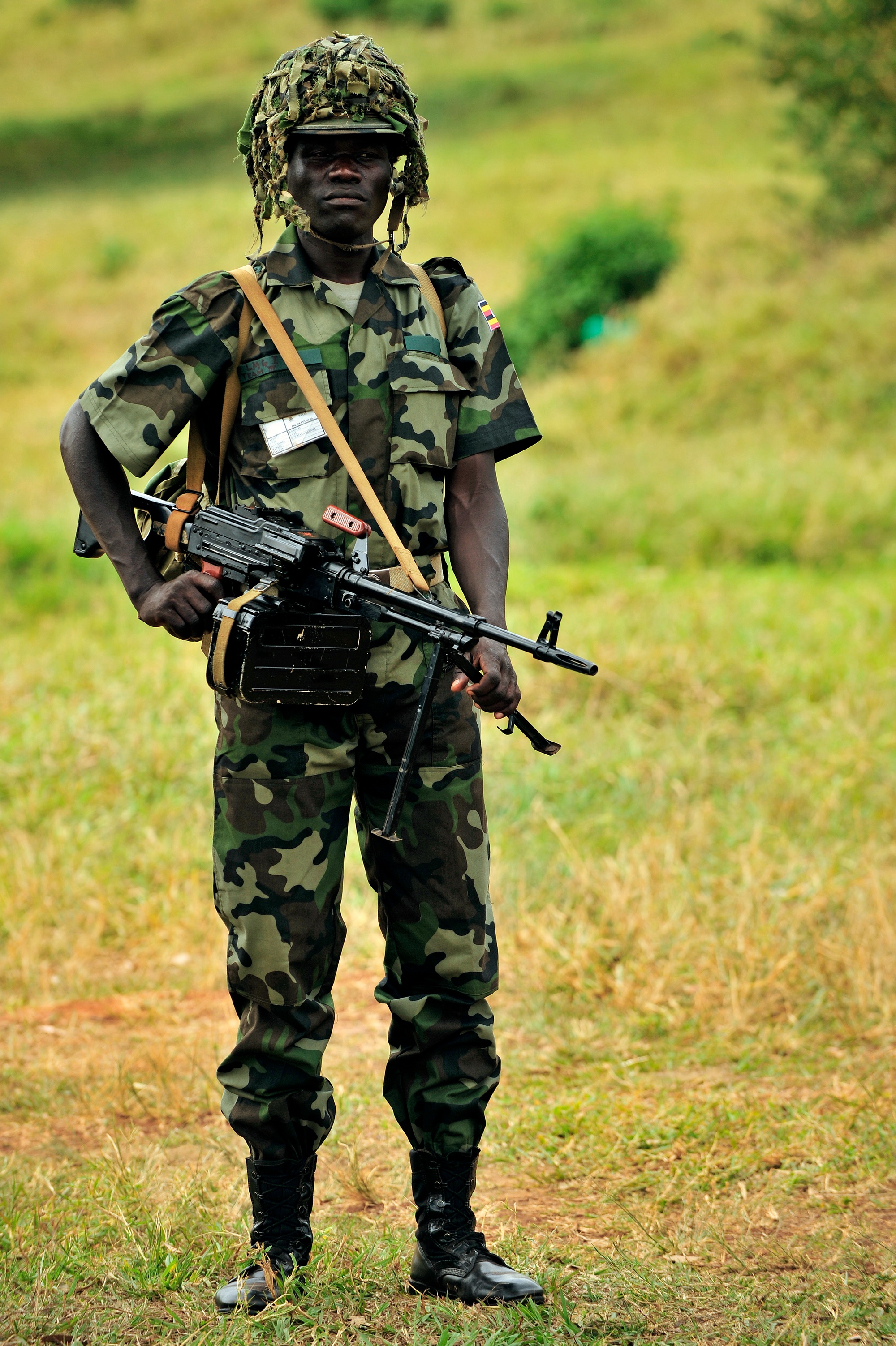 DVIDS - Images - A Uganda Peoples Defense Force soldier stands in a field  during a demonstration of skills learned during the UPDF Non-Commissioned  Officers Academy in Jinja. [Image 28 of 30]