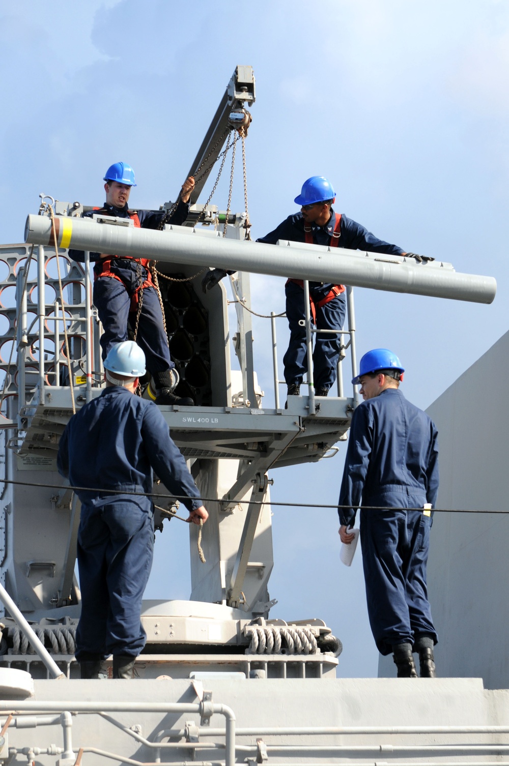 USS Wasp Marines, Sailors maintain helicopters