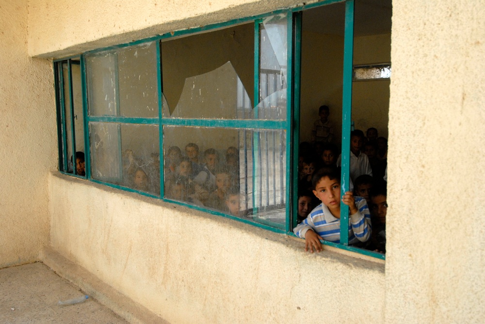 Soldiers give out school supplies