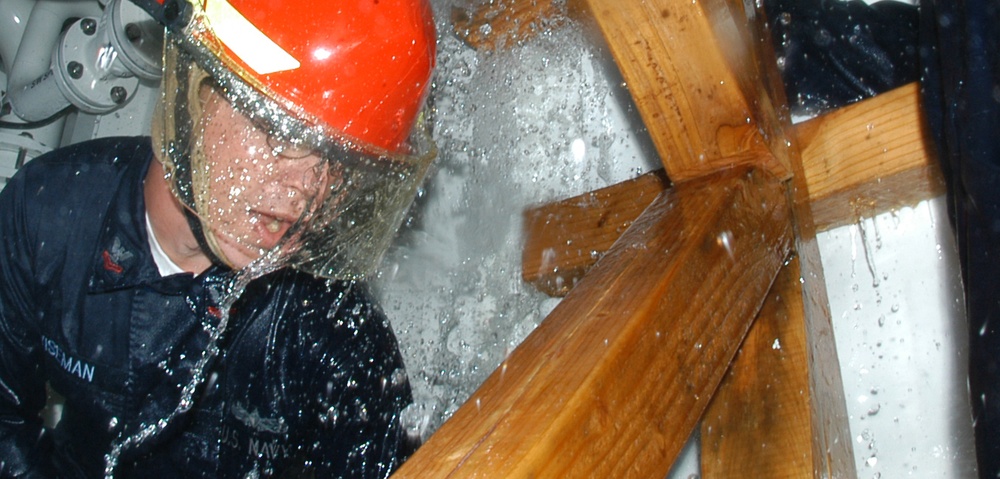 Patching a Pipe During Damage Control Training