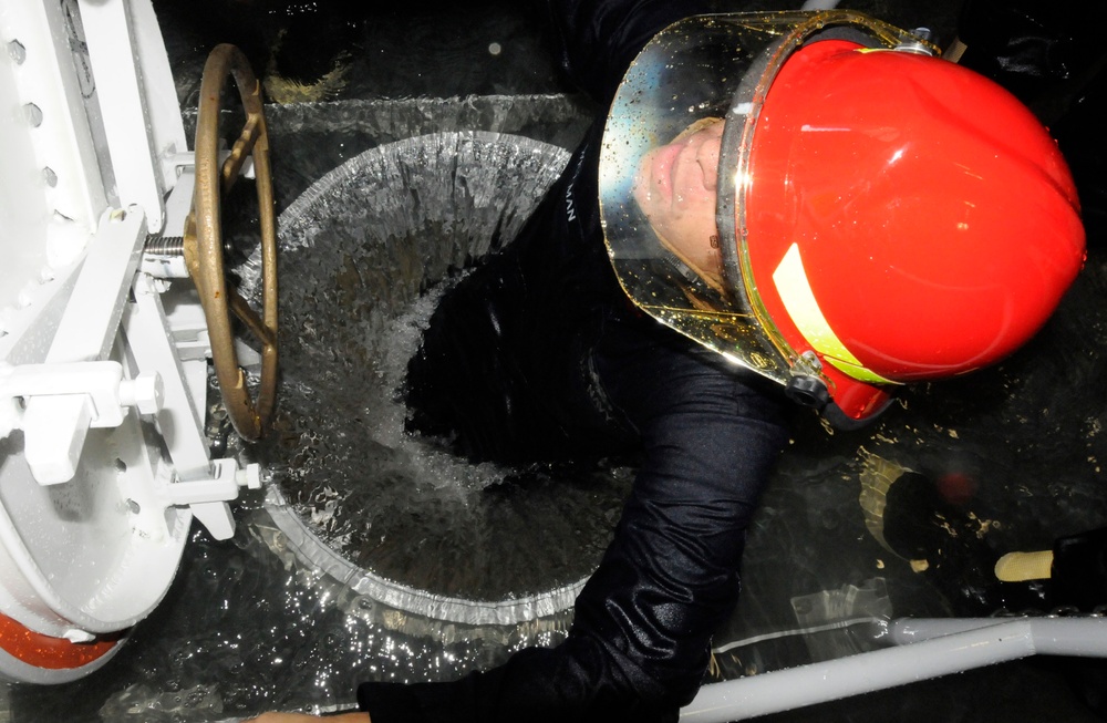 Patching a Pipe During Damage Control Training