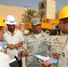Service members Hammer Out, Nail Down Iraqi Construction