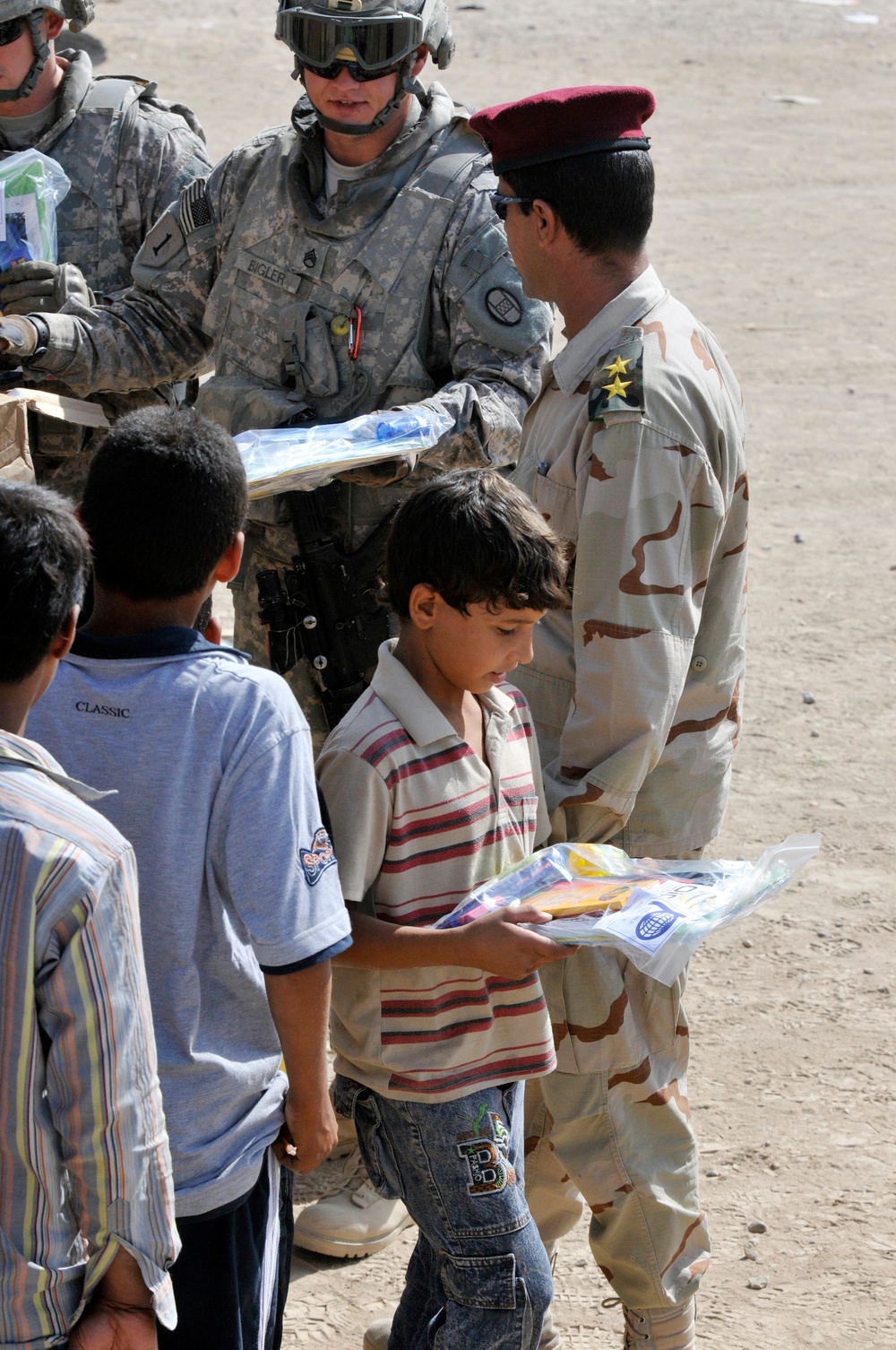 Soldiers deliver school supplies