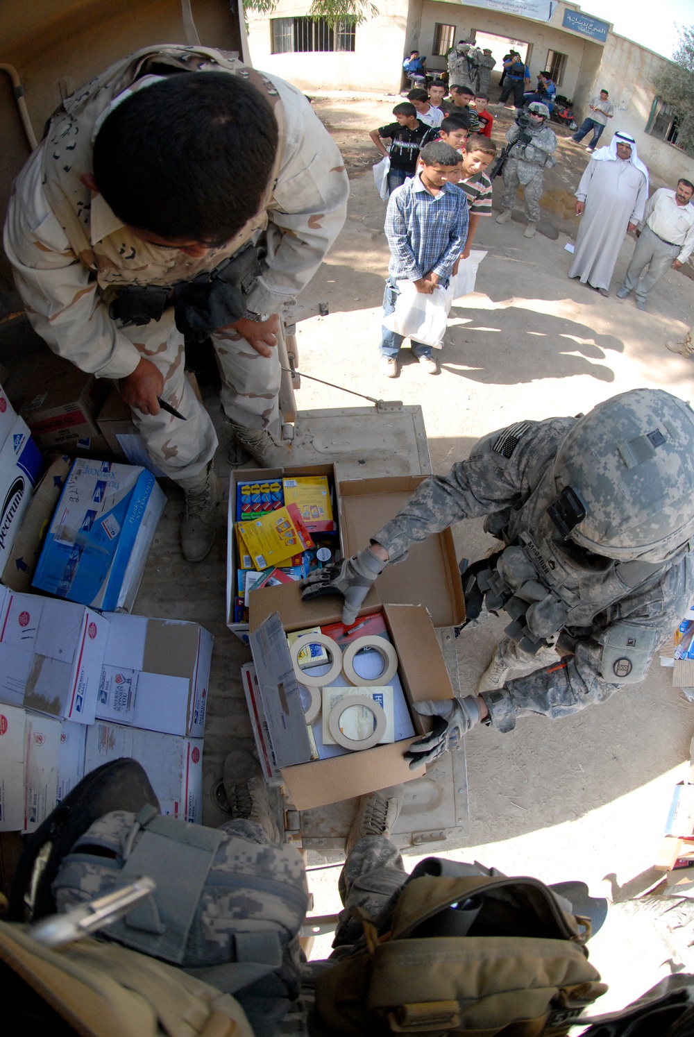 Soldiers deliver school supplies