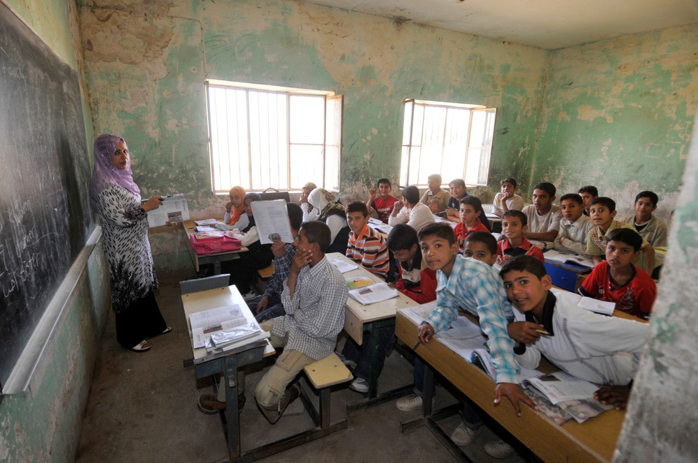 Soldiers deliver school supplies