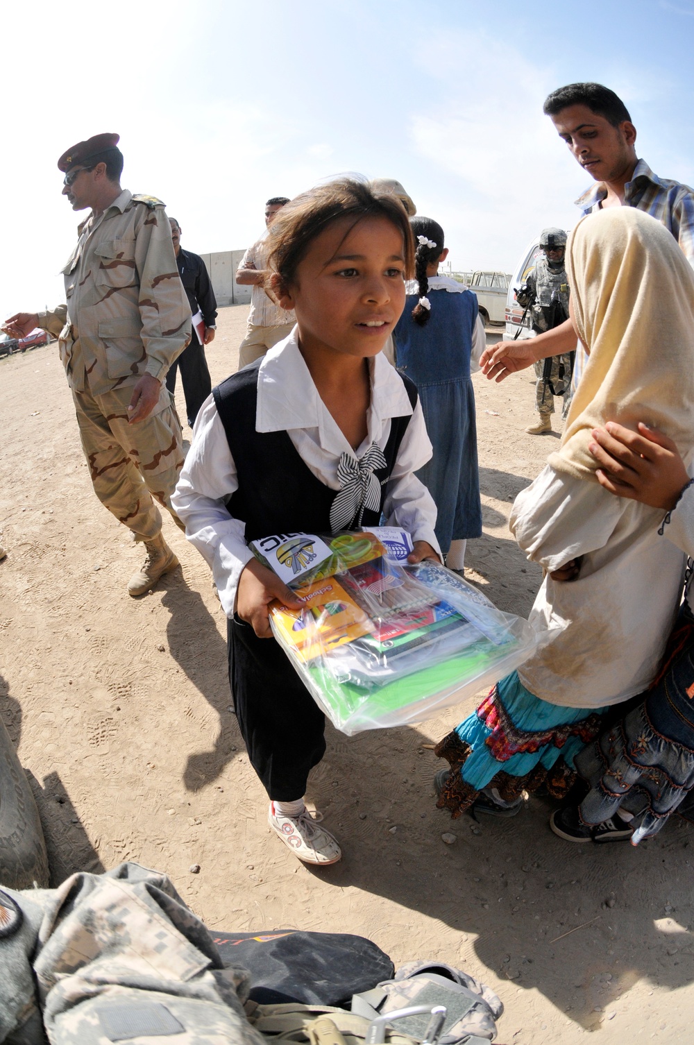 Soldiers deliver school supplies