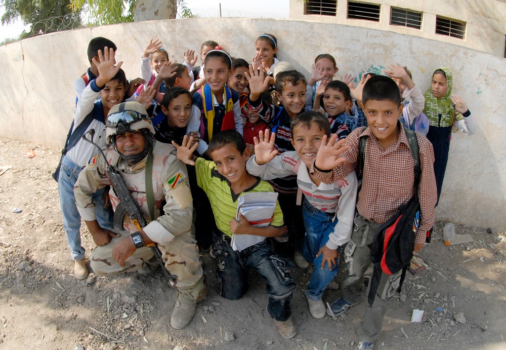 Soldiers deliver school supplies