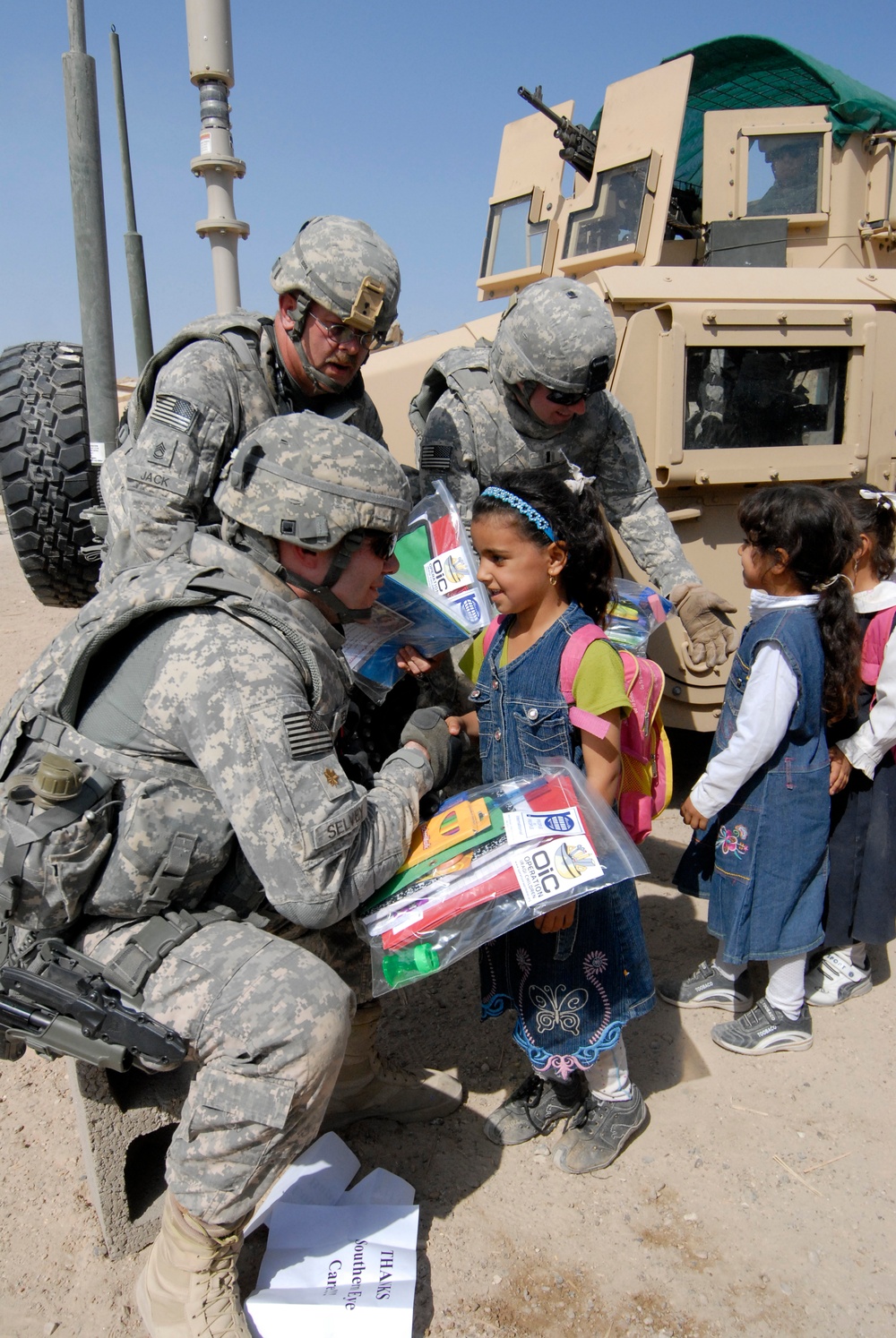 Soldiers deliver school supplies