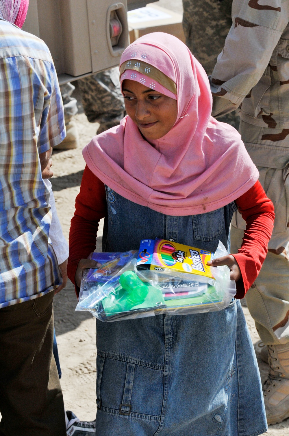 Soldiers deliver school supplies