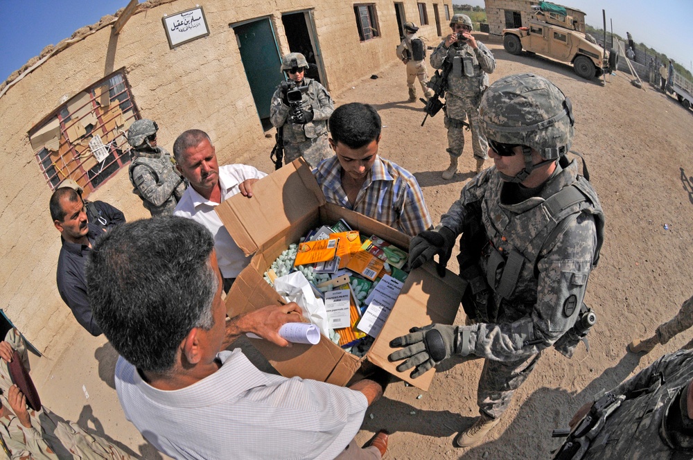 Soldiers deliver school supplies