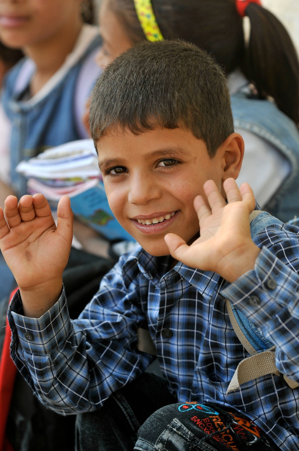 Soldiers deliver school supplies