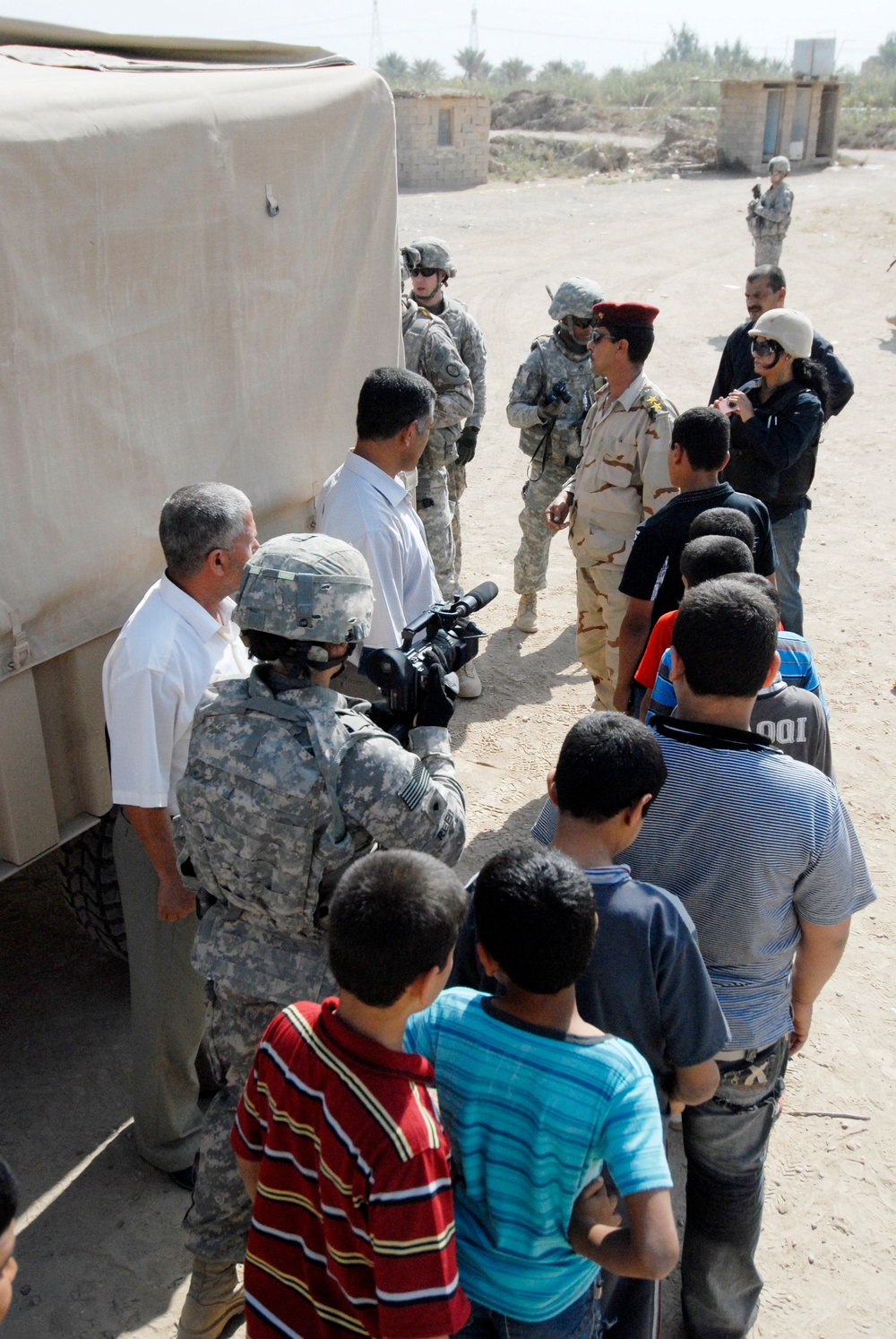 Soldiers deliver school supplies