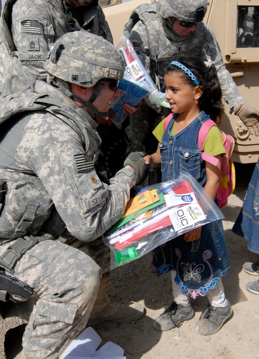 Soldiers deliver school supplies