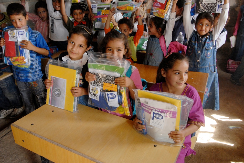 Soldiers deliver school supplies