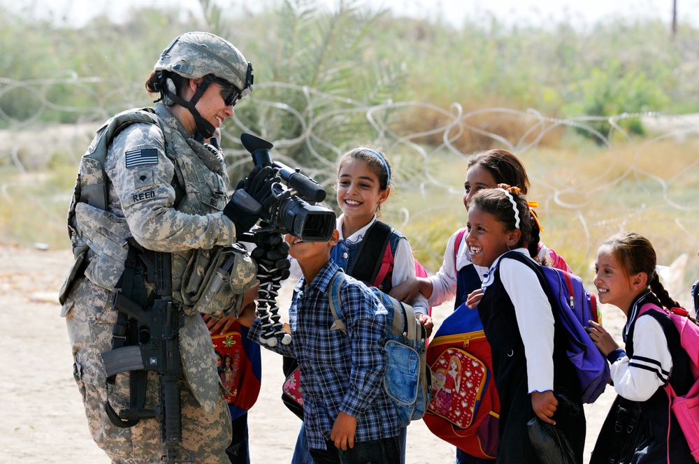 Soldiers deliver school supplies