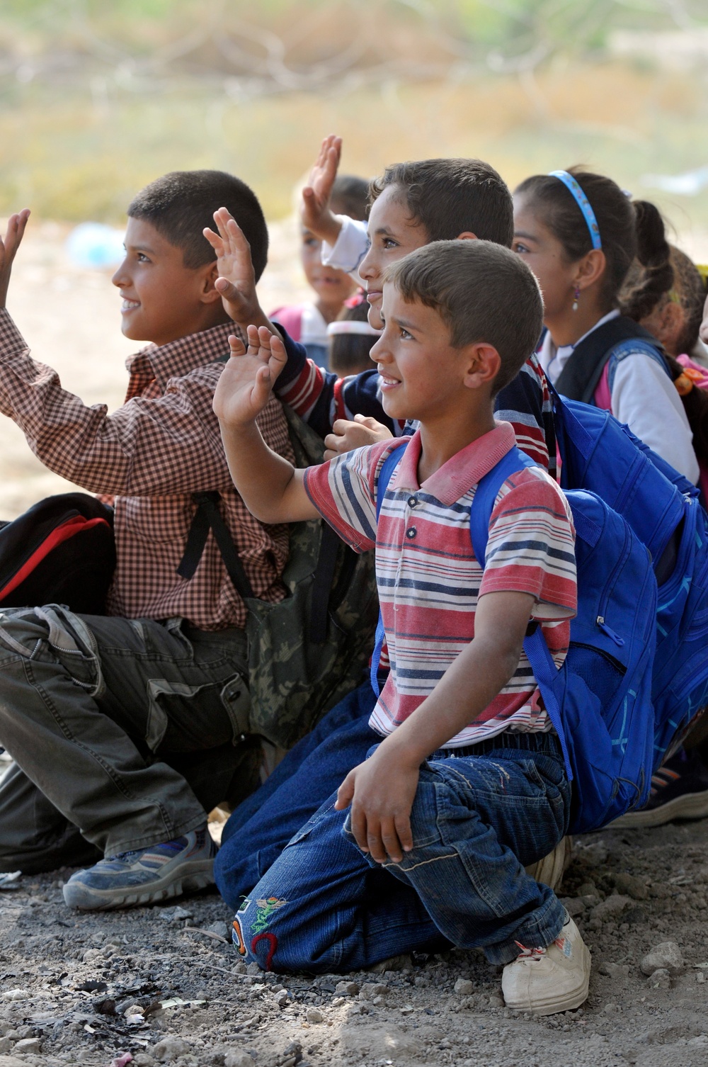 Soldiers deliver school supplies