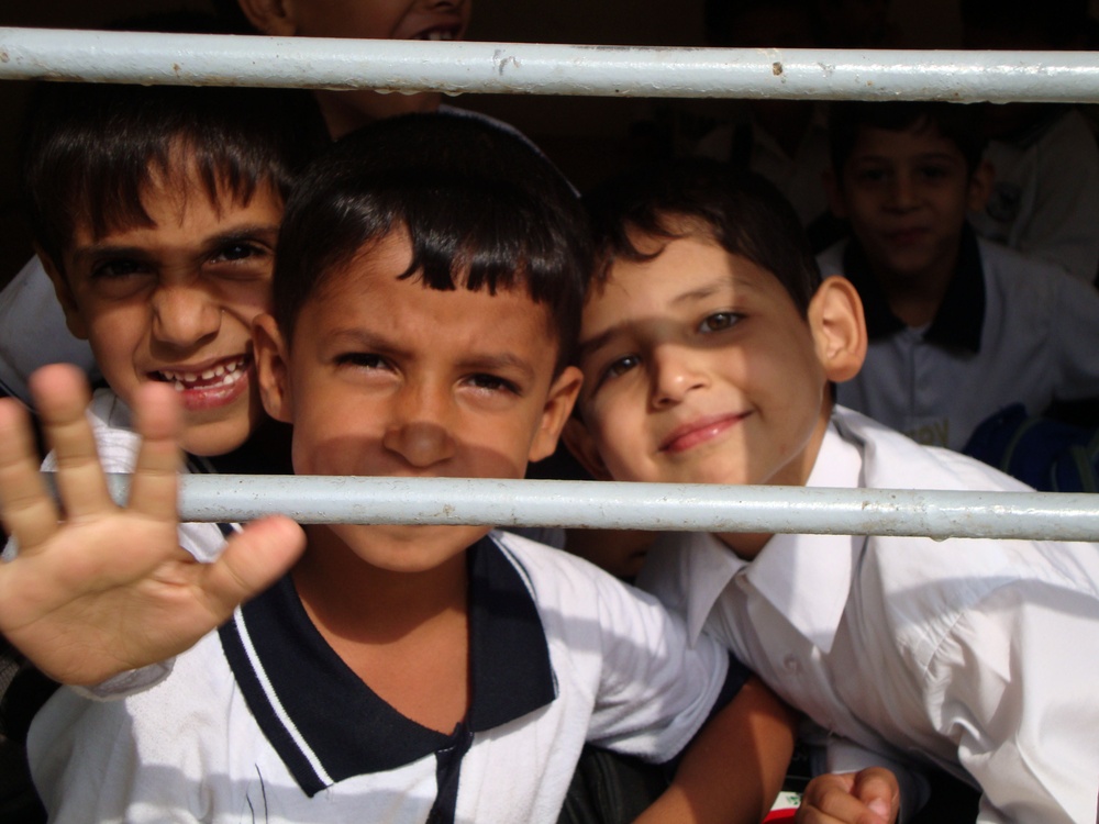 Iraqi Children Wave Iraqi Flags